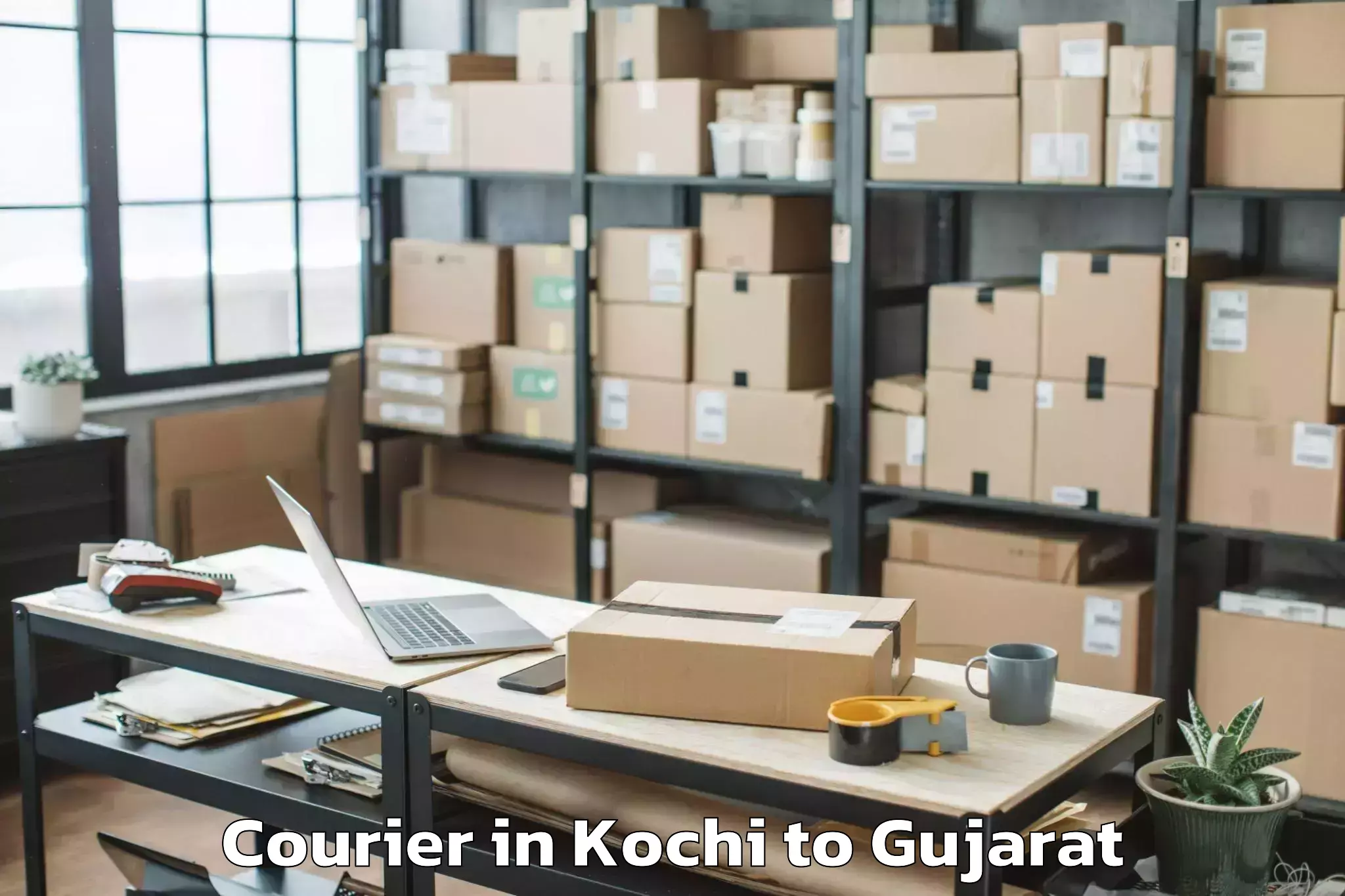 Get Kochi to Sardarkrushinagar Dantiwada Ag Courier